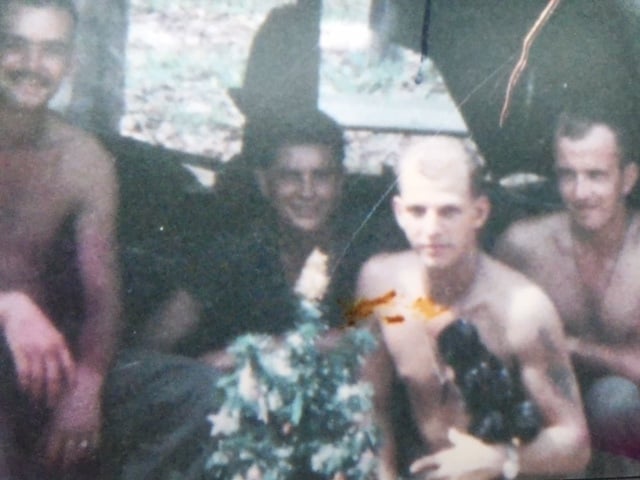  Bill Newvine (far right) celebrates Christmas 1966 in Vietnam.  From the Newvine Family Collection. 