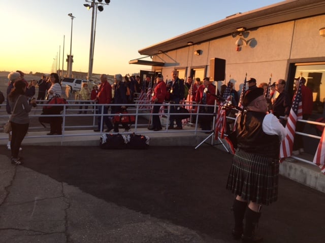  A grateful crowd wishes the Central Valley Honor Flight participants a safe trip.  Photo by Vaune Newvine 
