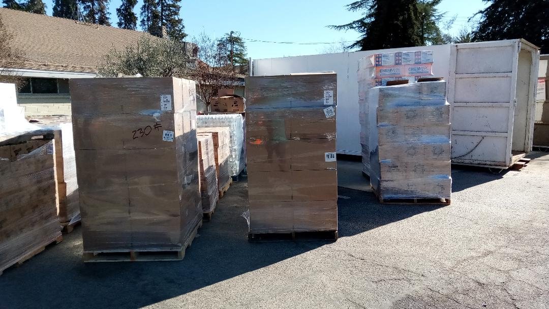Pallets of supplies are on-site at the Planada Community Center to serve homeowners trying to clean up and rebuild the damaged sections of their homes. Photo: Steve Newvine