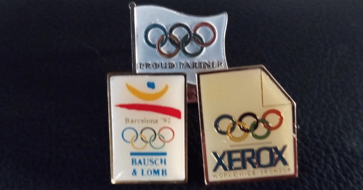   My collection representing over forty years as a working professional include these Olympic themed pins.  Photo:  Newvine Personal Collection 