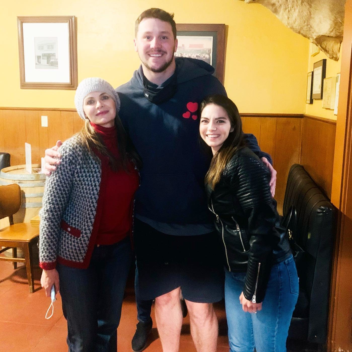  Buffalo Bills quarterback and Firebaugh native Josh Allen dines at Wool Growers when he visits family in the off-season.  He’s flanked here by owners Ruth Reynosa and Talisa Vander Poel.  Photo:  Wool Growers Restaurant Facebook page. 